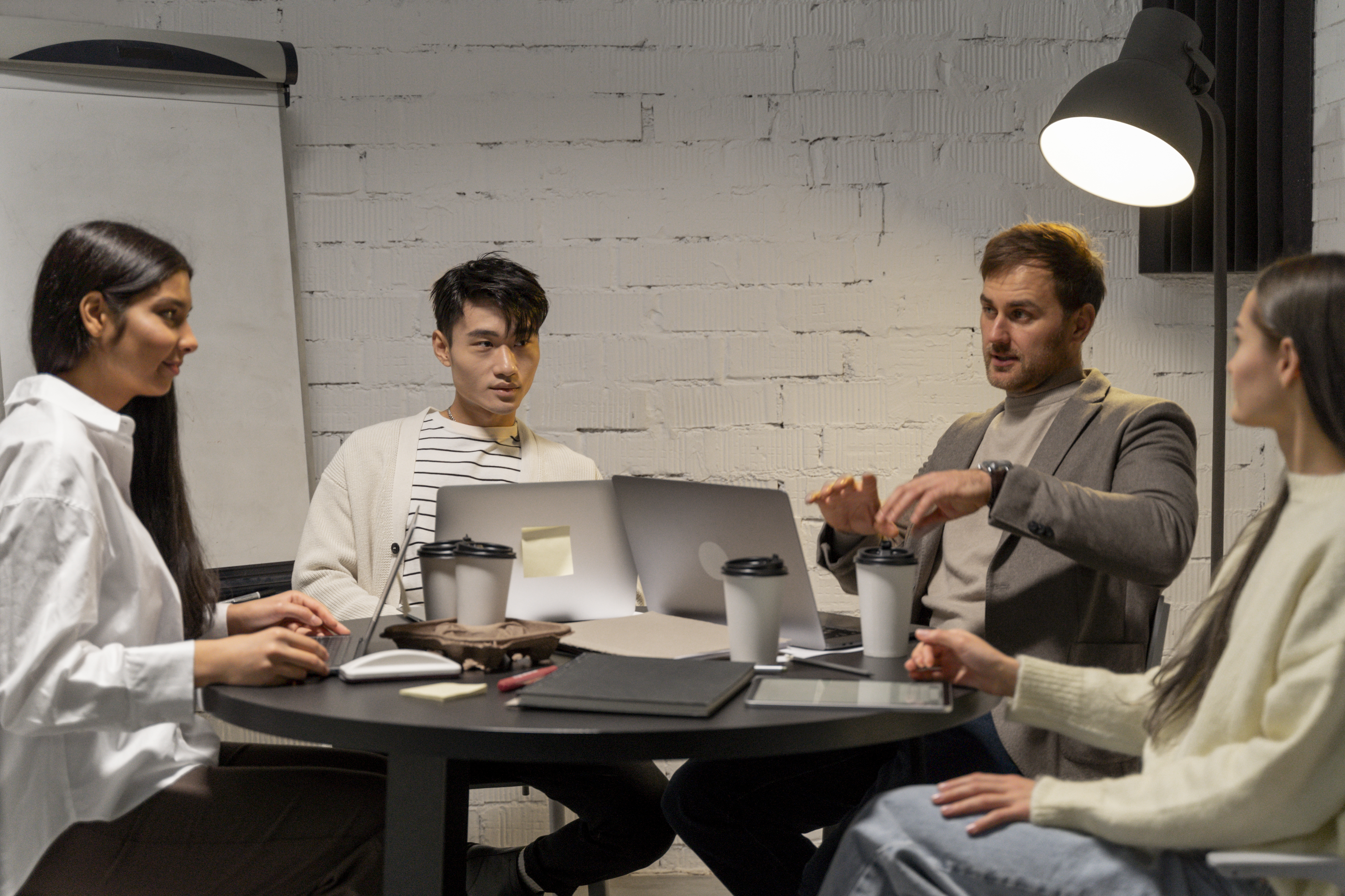 Small group of people discussing for business success growth